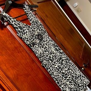 Enforce Studio belted animal prints v-necked luxury dress in like new condition!